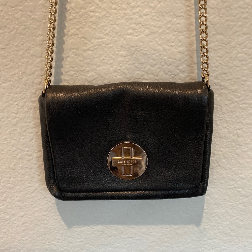 Kate Space crossbody purse (black) gold accents and pink interior